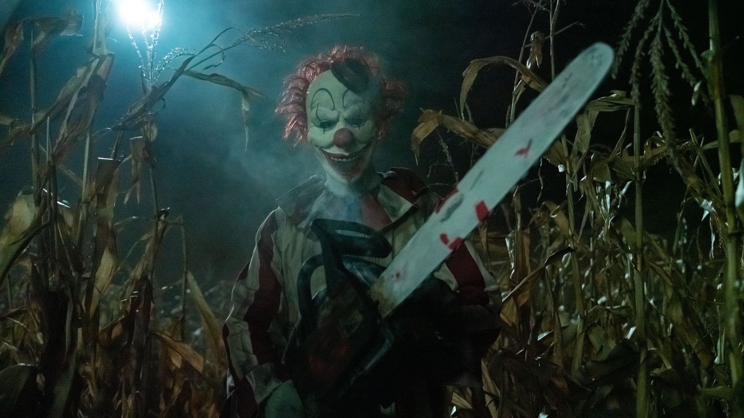 Clown in a Cornfield Background