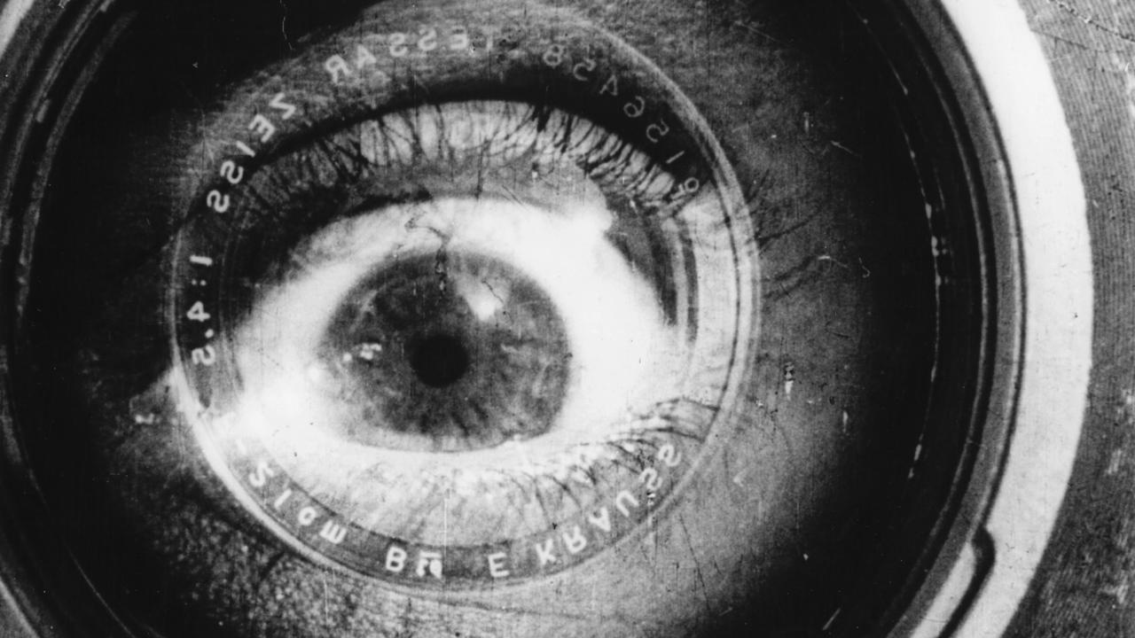 Man with a Movie Camera Background