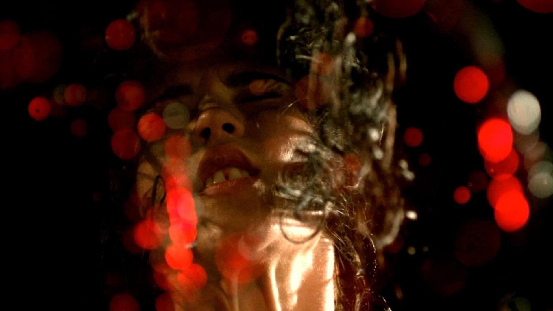 The Strange Color of Your Body's Tears Background